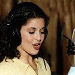 Kristen Waddell, actress, running lines in the audio studio.