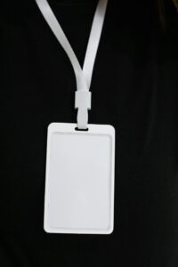 A blank name tag on a lanyard.