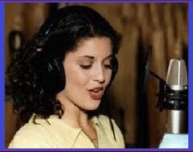 Kristen Waddell, actress, running lines in the audio studio.
