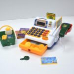 Child's toy cash register set.