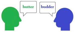 The silhouettes of two heads. One says butter and the other says budder to show the 2nd principle of accent reduction.