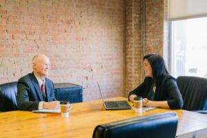 Two professionals engaged in a clear and empathetic business conversation.