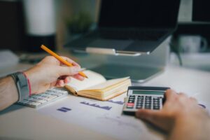 High school student calculating algebra solutions for digital SAT math prep