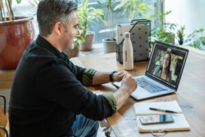 Professional looking confident while speaking on a video conference call.
